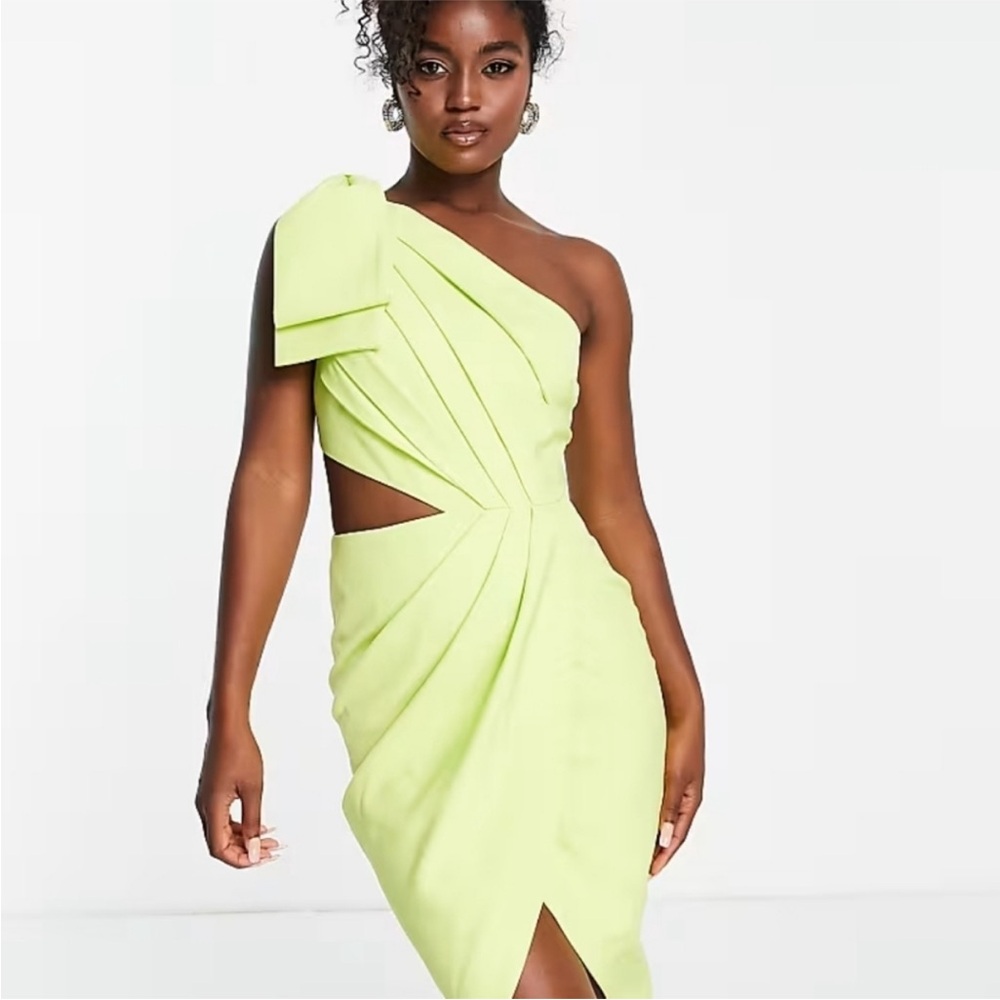 Lavish Alice 

One shoulder cutout wrap midi dress
NWT never worn
Size 8 US